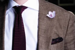 White and Violet Christmas Rose Boutonnière Flower
