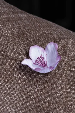 White and Violet Christmas Rose Boutonnière Flower